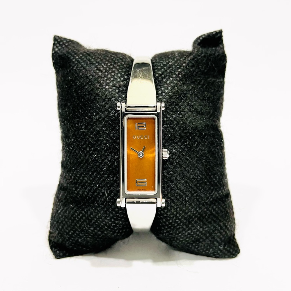Gucci Women’s Silver Bangle Watch with Amber Dial